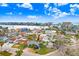 Scenic aerial view of a charming coastal neighborhood near the water, highlighting the property's prime location at 411 Virginia Ave, Madeira Beach, FL 33708