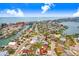 Breathtaking aerial view of the coastal community, showcasing a desirable location near canals and the ocean at 411 Virginia Ave, Madeira Beach, FL 33708