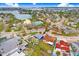 Desirable aerial shot of the property showcasing a waterfront community and tropical landscape at 411 Virginia Ave, Madeira Beach, FL 33708