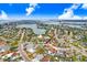 Expansive aerial view of the coastal community, illustrating the close proximity to the waterfront and nearby amenities at 411 Virginia Ave, Madeira Beach, FL 33708