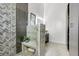 Stylish bathroom features a glass shower, marbled bench seat, and sleek vanity for ultimate relaxation at 4156 Gauge Line Loop, Tampa, FL 33624