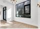 Bright room with wood floors and a large window that provides natural light at 4156 Gauge Line Loop, Tampa, FL 33624
