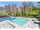 Beautifully landscaped pool area with lounge chairs and a relaxing atmosphere at 4156 Gauge Line Loop, Tampa, FL 33624