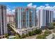 Beautiful high-rise condo building featuring a modern design and multiple balconies on a sunny day at 450 Knights Run Ave # 1704, Tampa, FL 33602