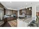 Well-equipped kitchen featuring stainless steel appliances and granite countertops with bar seating at 450 Knights Run Ave # 1704, Tampa, FL 33602