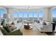Bright, airy living room with comfortable seating and expansive windows offering scenic views at 450 Knights Run Ave # 1704, Tampa, FL 33602