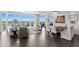 A stylish living room with elegant furnishings, dark floors, and stunning water views at 450 Knights Run Ave # 1704, Tampa, FL 33602