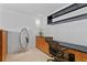 Bright office offers minimalist design, built-in desk with storage, and a full length mirror at 450 Knights Run Ave # 1704, Tampa, FL 33602