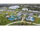 Aerial view shows the community playground, splashpad, and parking, perfect for families at 4735 Foxshire Cir, Tampa, FL 33624