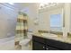 Bathroom features a tub/shower combination and single vanity at 4739 Silverking Way, Palm Harbor, FL 34684