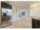 Bright kitchen with stainless steel appliances, tile flooring, and a breakfast nook with natural light at 4739 Silverking Way, Palm Harbor, FL 34684