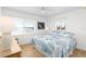 Bedroom with water views and coastal decor at 9696 Little Gasparilla Isand, Placida, FL 33946