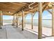 Exterior view under the home featuring waterfront views at 9696 Little Gasparilla Isand, Placida, FL 33946