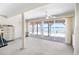 Spacious room features floor-to-ceiling glass doors with water views at 9696 Little Gasparilla Isand, Placida, FL 33946