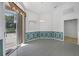 Dining room with tiled floors, sliding glass doors and decorative molding at 14472 Linden Dr, Spring Hill, FL 34609
