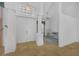 Spacious foyer with high ceilings, tile flooring, and a view into the adjacent sitting room at 14472 Linden Dr, Spring Hill, FL 34609