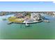 Waterfront home featuring a private dock and pool situated in a serene waterfront setting at 11005 5Th E St, Treasure Island, FL 33706