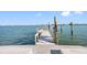 This property has its own private dock for boating, fishing and enjoying the open water and sky at 11005 5Th E St, Treasure Island, FL 33706