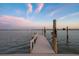 This property has its own private dock for boating, fishing and enjoying the open water and sky at 11005 5Th E St, Treasure Island, FL 33706