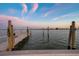Close up view of a private dock for boating, fishing and enjoying waterfront living at 11005 5Th E St, Treasure Island, FL 33706