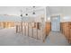 Large living room being remodeled offering lots of square footage and a front door at 11005 5Th E St, Treasure Island, FL 33706