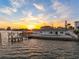 Charming waterfront home with a private dock, waterfront views, and ample outdoor space at 11005 5Th E St, Treasure Island, FL 33706