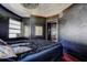 Modern bedroom is painted black and a stylish light fixture and plenty of windows at 1111 Dr M L King Jr N St, Safety Harbor, FL 34695