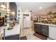 Bright kitchen featuring tile floors, ample counter space and stainless steel appliances at 12111 Scott Dr, Dade City, FL 33525