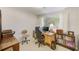 Functional office featuring a desk, chair, and storage solutions for optimal productivity at 13450 Wilcox Rd, Largo, FL 33774