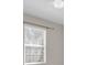 Bedroom with a ceiling fan, a window with blinds, and neutral paint at 13946 Snapper Fin Ln, Tampa, FL 33637