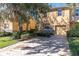 Charming home with a brick driveway and well-maintained landscaping at 13946 Snapper Fin Ln, Tampa, FL 33637