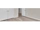 Hallway featuring luxury vinyl plank flooring and neutral colored paint at 13946 Snapper Fin Ln, Tampa, FL 33637
