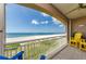 Enjoy breathtaking ocean views from this spacious balcony, complete with comfortable seating at 18700 Gulf Blvd # 6, Indian Shores, FL 33785