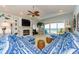 Spacious living room featuring a fireplace and balcony with ocean views at 18700 Gulf Blvd # 6, Indian Shores, FL 33785