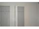 An interior closet with shelf and clothing rod at 3399 Mermoor Dr # 110, Palm Harbor, FL 34685