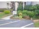 Well-maintained landscape with a no-parking loading zone sign at 3399 Mermoor Dr # 110, Palm Harbor, FL 34685