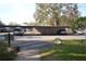 Assigned covered parking spaces within the community at 3399 Mermoor Dr # 110, Palm Harbor, FL 34685