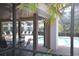 Enjoy covered patio seating next to the beautiful community pool at 3399 Mermoor Dr # 110, Palm Harbor, FL 34685