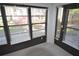 Bright sunroom features an abundance of natural light with a door to exterior at 3399 Mermoor Dr # 110, Palm Harbor, FL 34685