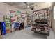 Garage features a golf cart and sports memorabilia at 3550 100Th N Pl, Pinellas Park, FL 33782