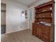 Hallway featuring a cabinet for storage space at 3550 100Th N Pl, Pinellas Park, FL 33782