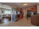 Spacious kitchen with stainless appliances and breakfast bar open to living space at 3550 100Th N Pl, Pinellas Park, FL 33782