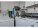 Laundry area with a new washer and dryer at 3550 100Th N Pl, Pinellas Park, FL 33782