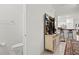 Powder room featuring a toilet and a pedestal sink at 36419 Garden Wall Way, Zephyrhills, FL 33541