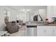 Bright open-concept living area with ample natural light and a seamless flow at 36419 Garden Wall Way, Zephyrhills, FL 33541