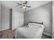 Bedroom with a ceiling fan, closet, and carpet flooring at 4043 Salida Del Sol Dr, Sun City Center, FL 33573