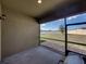 View of the covered patio overlooking the fenced-in backyard at 4043 Salida Del Sol Dr, Sun City Center, FL 33573
