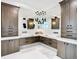 Modern bathroom with dual vanities, sleek cabinetry, and elegant lighting at 4816 W San Jose St, Tampa, FL 33629