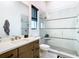 Contemporary bathroom featuring a glass shower, a light wood vanity, and a modern design at 4816 W San Jose St, Tampa, FL 33629