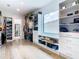 Spacious walk-in closet with custom shelves, drawers, and a window bench at 4816 W San Jose St, Tampa, FL 33629